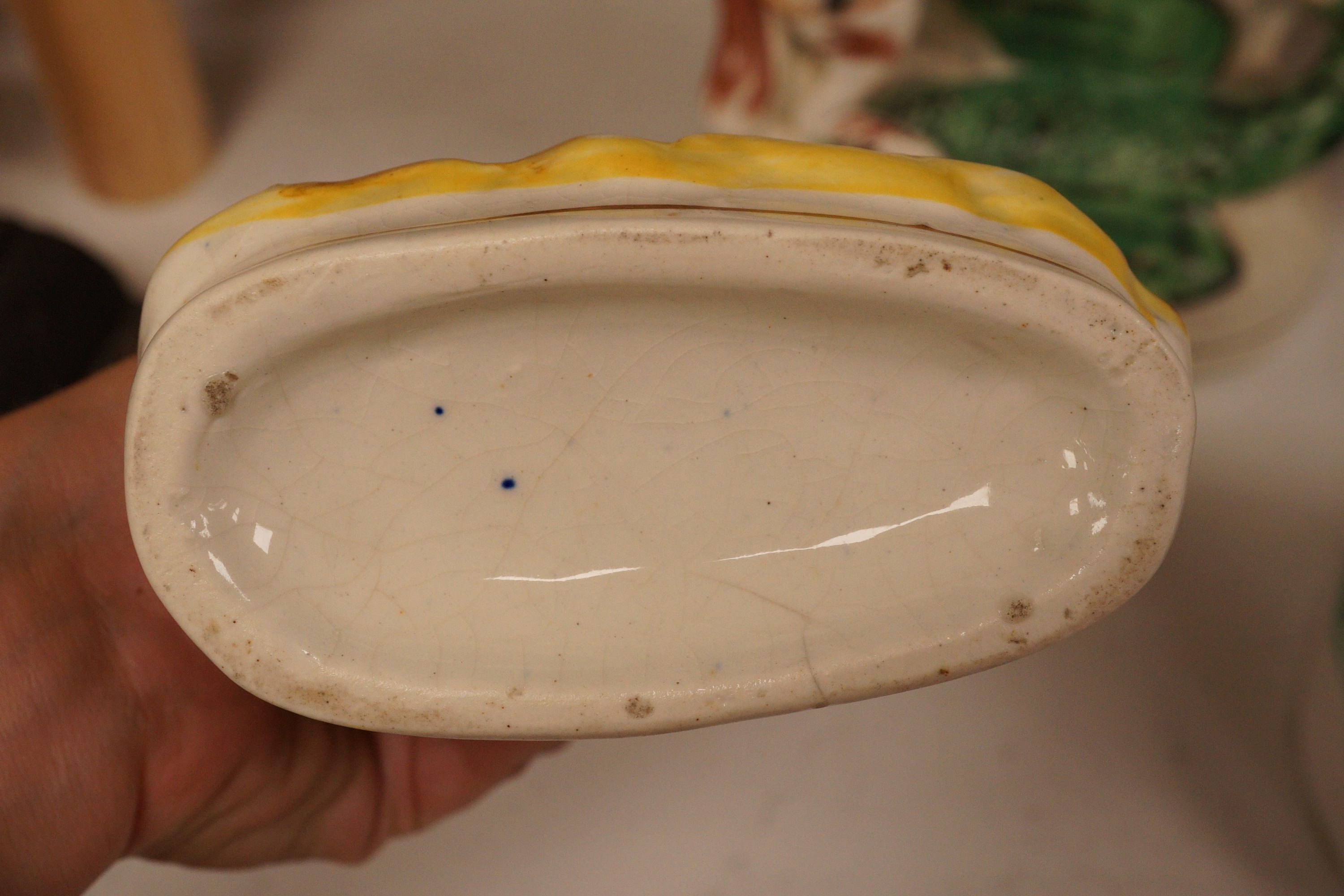 A group of Staffordshire pottery groups, tallest 38cm